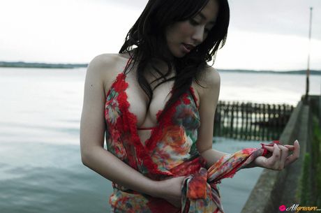 Asian beauty Momoko Tani removes her bikini before a finger fuck