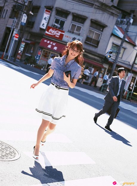 Asian covergirl Nozomi Sasaki takes off her glasses before getting naked