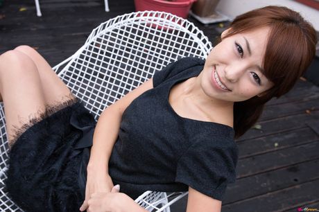 Asian girl Misato Kashiwagi demonstrates her nice tits and poses in a solo