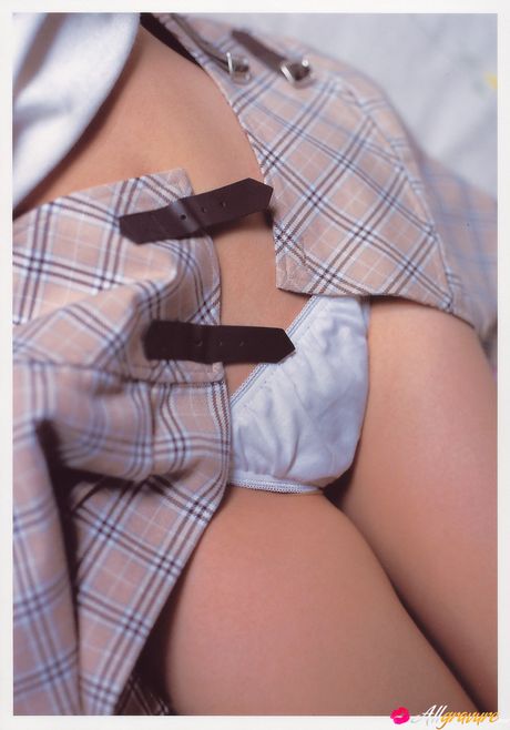 Asian cutie Yuka Kato removes her bra and panties before showing her twat