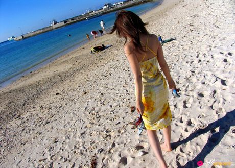 Asian cutie Yua Aida reveals her nice tits and poses in a solo