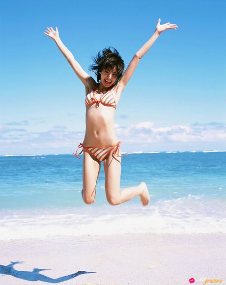 Bikini clad Akina Minami showing off teeny tits and shaved pussy