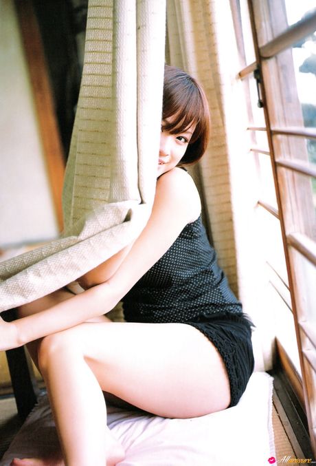 Brown-eyed Japanese beauty Eri Kamei is a sweetie to look at