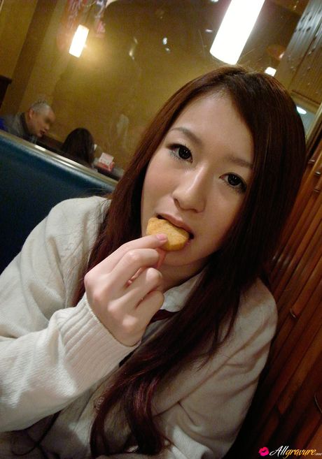 Asian covergirl Akane exhibits her teeny tits and poses in a solo