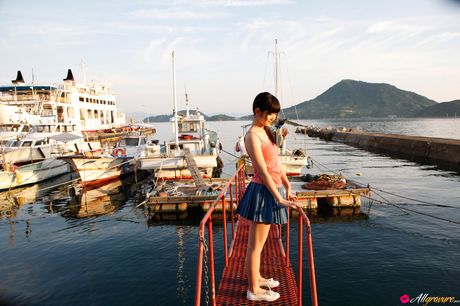 Asian teen Airi Suzuki takes off her dress and reveals her small tits