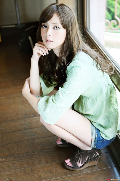 Wonderful Asian teen Nozomi Sasaki reveals her small boobs and her shaved pussy