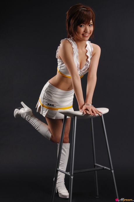 Hot Asian teen Ryoko Tanaka shows her massive tits and poses