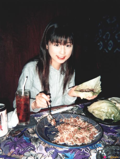 Asian girl Yuko Ogura unveils her small tits and poses in a solo