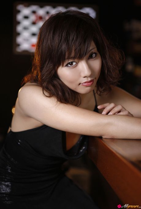 Asian doll Marie Kai slips off her lingerie before getting naked