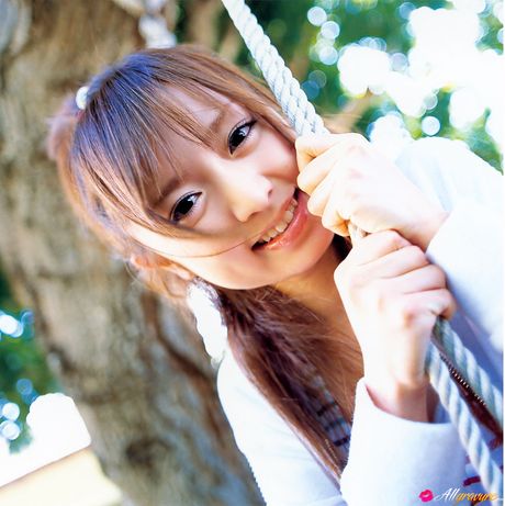 Brown-eyed and brown-haired, she is a natural beauty