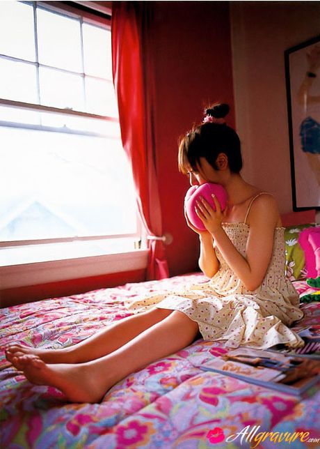 Brown-eyed and brown-haired, she is a natural beauty