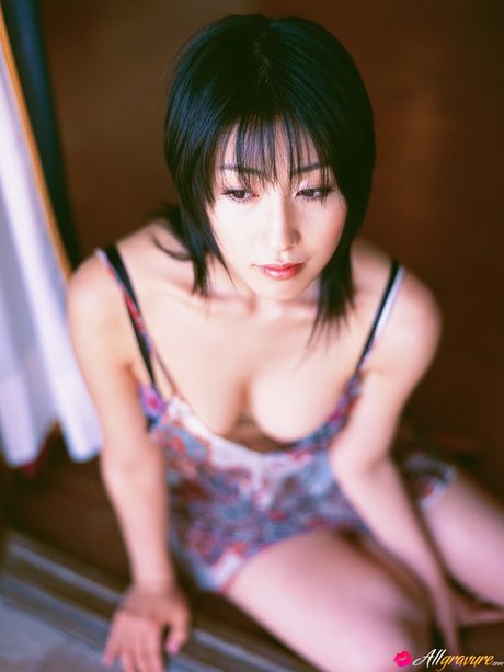 Asian teen Hiroko Sato highlights her amazing melons and captures her skyclad appearance
