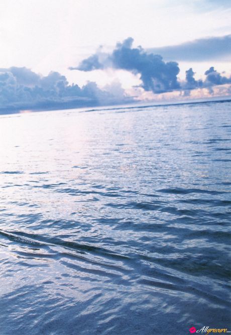 Asian teen Kasumi Nakane gets naked on a chair in a black dress