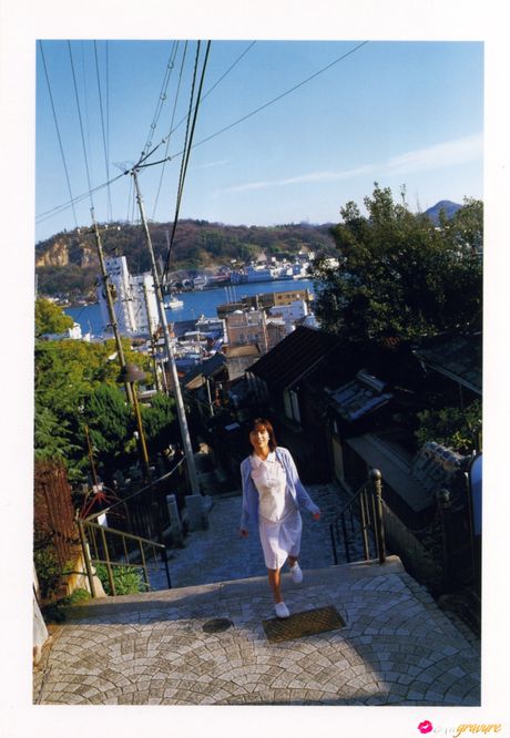 Asian teen Kasumi Nakane gets naked on a chair in a black dress