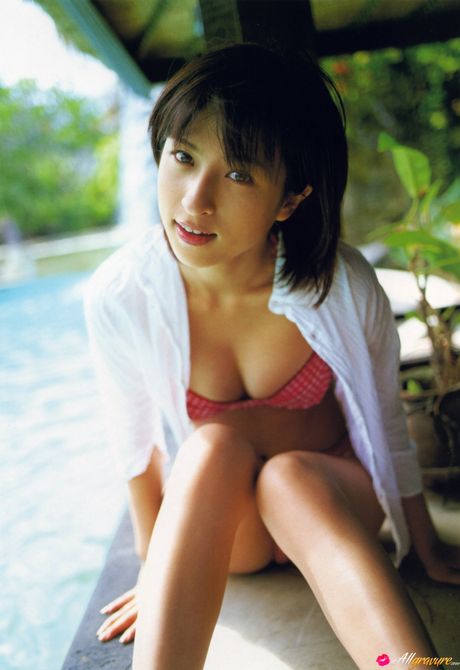 Asian teen Kasumi Nakane gets naked on a chair in a black dress