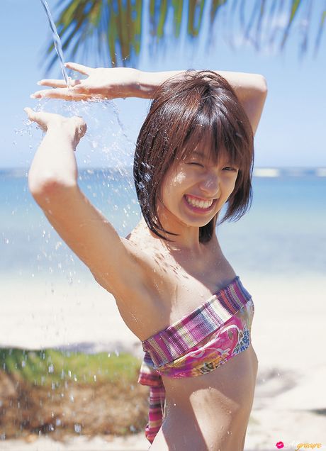 Thin japanese beauty Akina Minami highlights her petite tits and poses in a solo