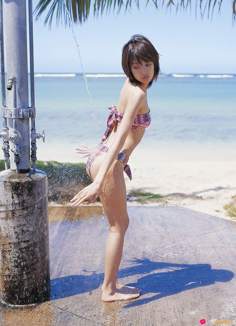 Thin japanese beauty Akina Minami highlights her petite tits and poses in a solo