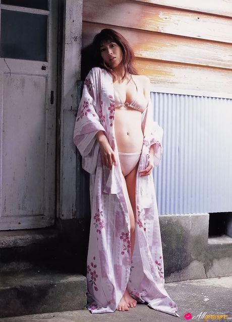 Asian cutie Emi Kobayashi demonstrates her amazing tits and exhibits her nudity in a solo