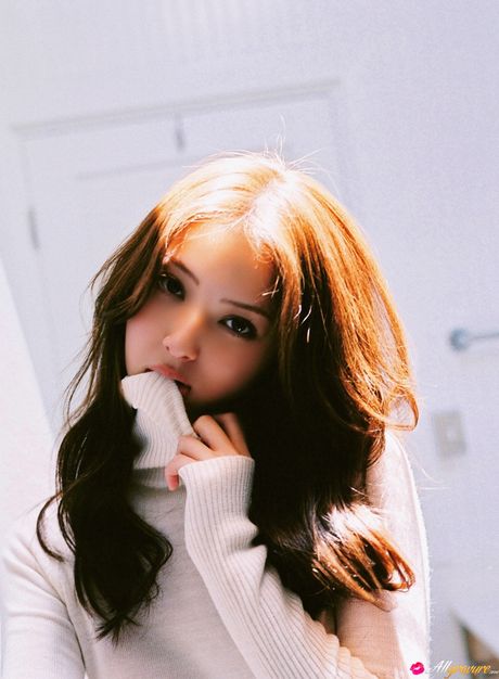 Asian teen Nozomi Sasaki shows her teeny tits and poses in a solo