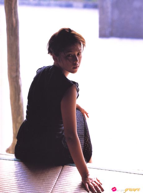 Asian beauty Miho Yoshioka removes her bikini and demonstrates her amazing racks