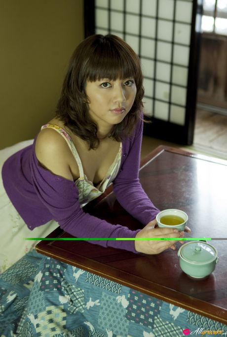 Brown-Eyed japanese beauty Marie Kai is posing in her sexy lingerie