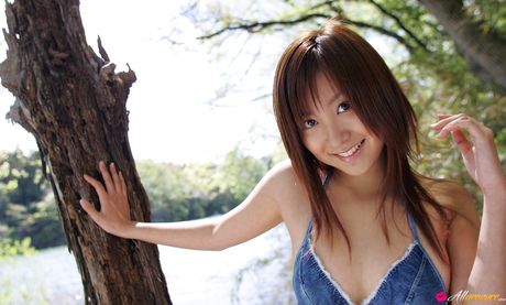 Brown-eyed Japanese babe Aya Kiguchi displays her natural tits