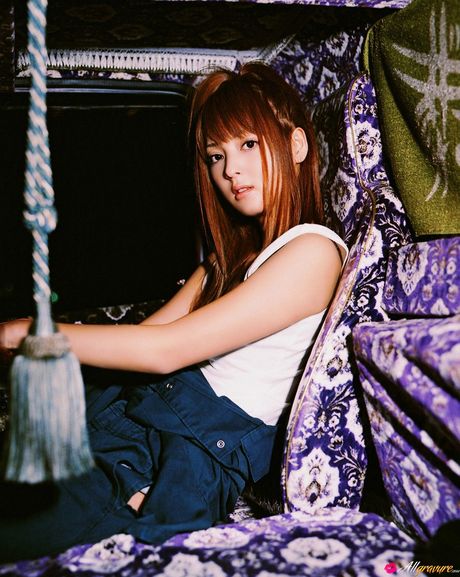 Wonderful Asian teen Nozomi Sasaki shows her huge tits and her hairy pussy