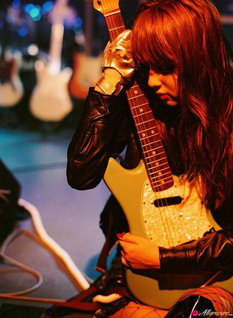 Wonderful Asian teen Nozomi Sasaki shows her huge tits and her hairy pussy