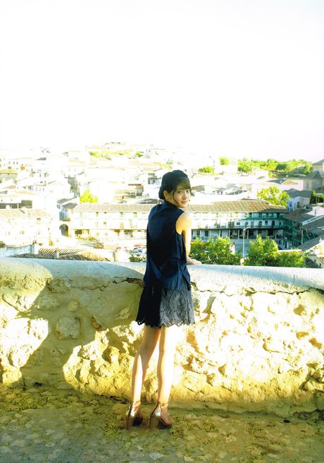 Asian girl Yumi Wakatsuki demonstrates her big tits and poses in the countryside