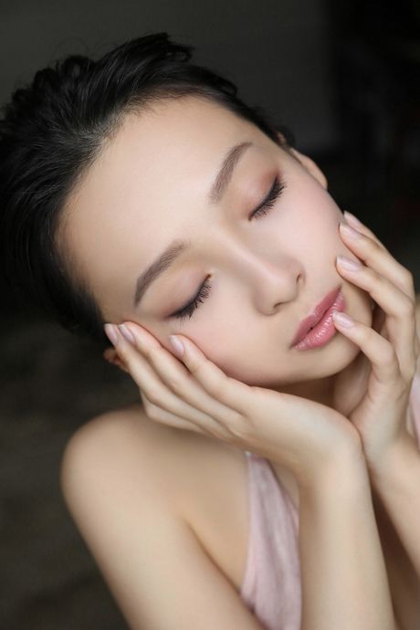 Asian model Asuka Hanamura presents her large boobs and poses in a solo