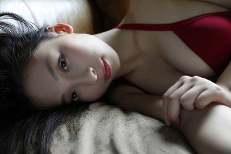 Asian model Asuka Hanamura presents her large boobs and poses in a solo