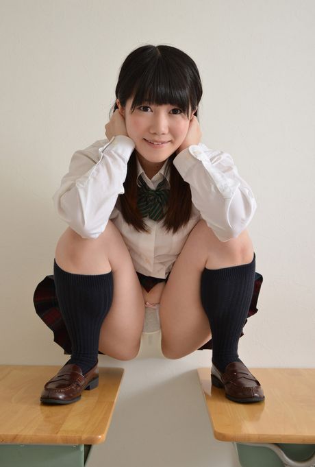 Asian beauty Momo Watanabe strips to her stockings and displays her small tits