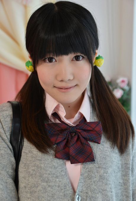 Asian cutie Momo Watanabe demonstrates her small tits and poses in white stockings