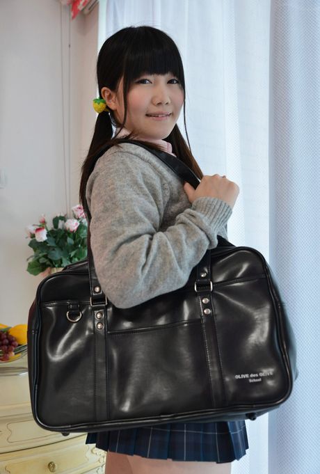 Asian cutie Momo Watanabe demonstrates her small tits and poses in white stockings