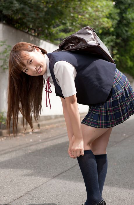 Asian schoolgirl Nagase Maho exhibits her petite small tits and poses in a uniform