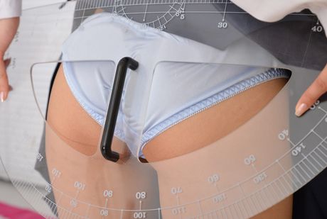 Brown-eyed cutie Mayu Satou strips to her stockings and poses