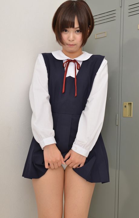 Brown-eyed cutie Mayu Satou strips to her stockings and poses
