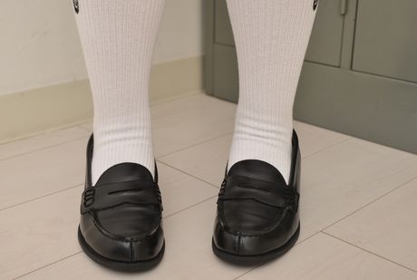 Brown-eyed cutie Mayu Satou strips to her stockings and poses