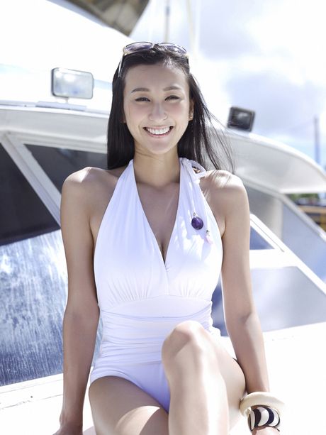 Asian cutie Asada Mai models a bikini in a field of wheat