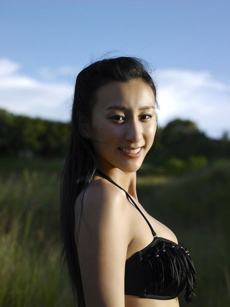 Asian cutie Asada Mai models a bikini in a field of wheat