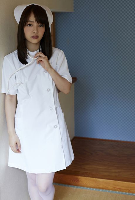 Asian cutie Haruka Ando slips off her clothes to model in the nude