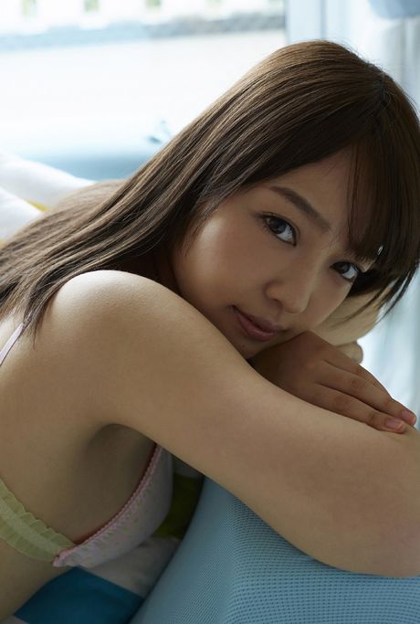 Asian cutie Haruka Ando slips off her clothes to model in the nude