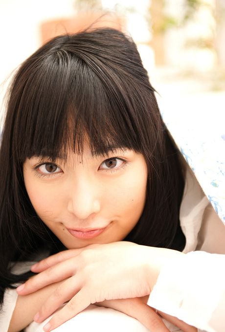 Asian stunner Kana Yume shows her teeny tits and bald pussy in a solo