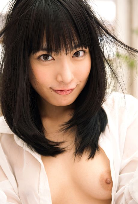 Asian stunner Kana Yume shows her teeny tits and bald pussy in a solo