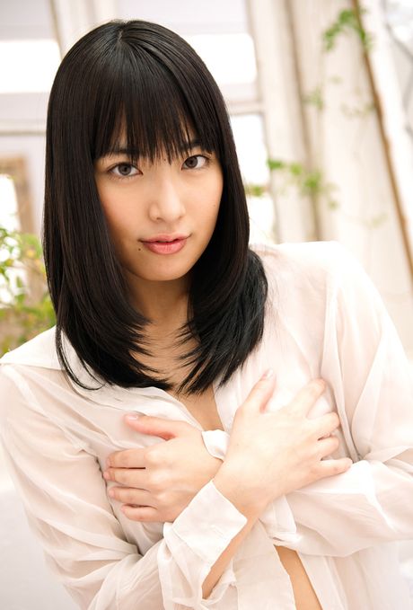 Asian stunner Kana Yume shows her teeny tits and bald pussy in a solo