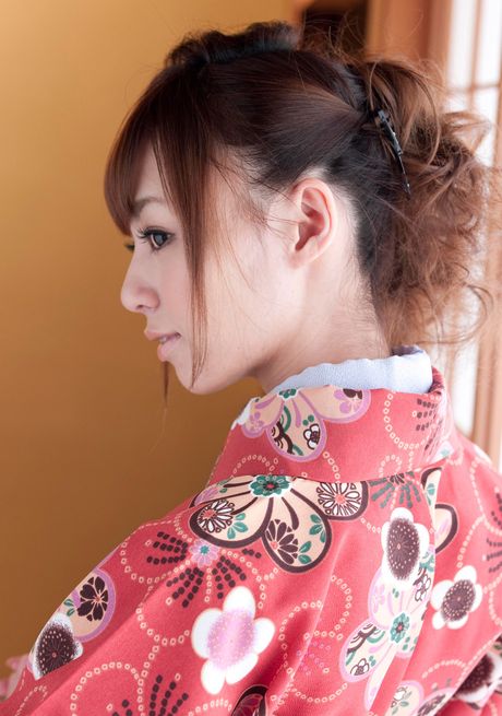 Asian girl Hoshi Ai slips off a red kimono to get naked in socks