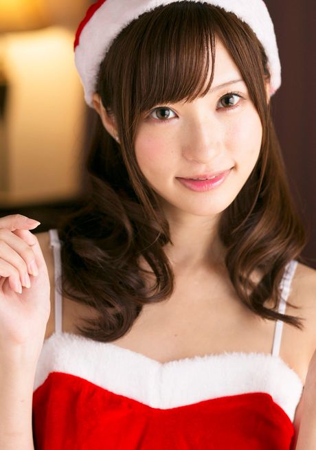 Asian covergirl Angel Moe gets naked in a Santa hat and a belt