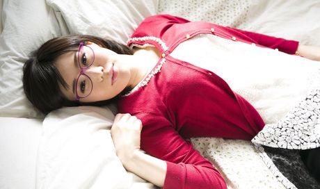 Asian girl Nanako Mori removes her glasses before masturbating