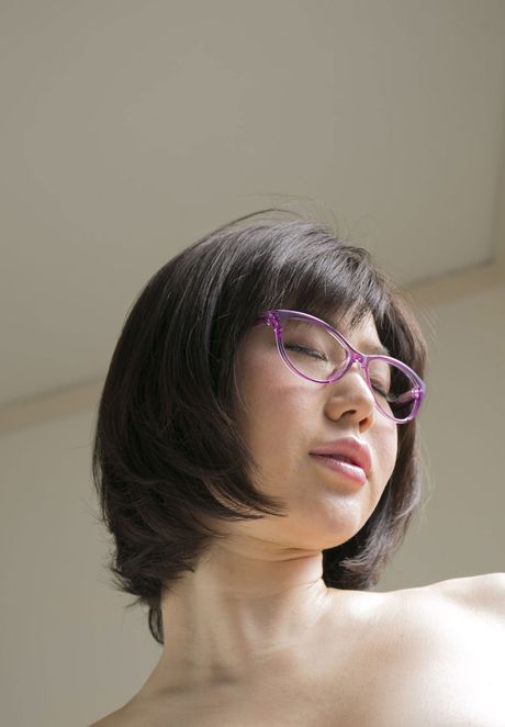 Asian girl Nanako Mori removes her glasses before masturbating