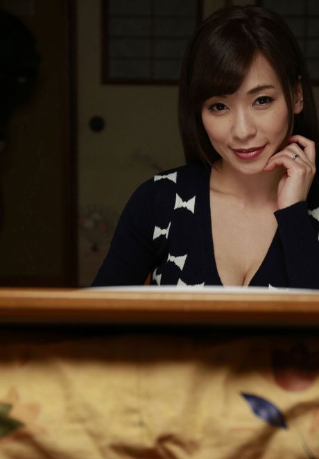 Asian covergirl Kaho Kasumi gets completely naked on a bed provocatively